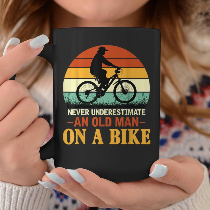 Never Underestimate Funny Quote An Old Man On A Bicycle Retr Coffee Mug Funny Gifts