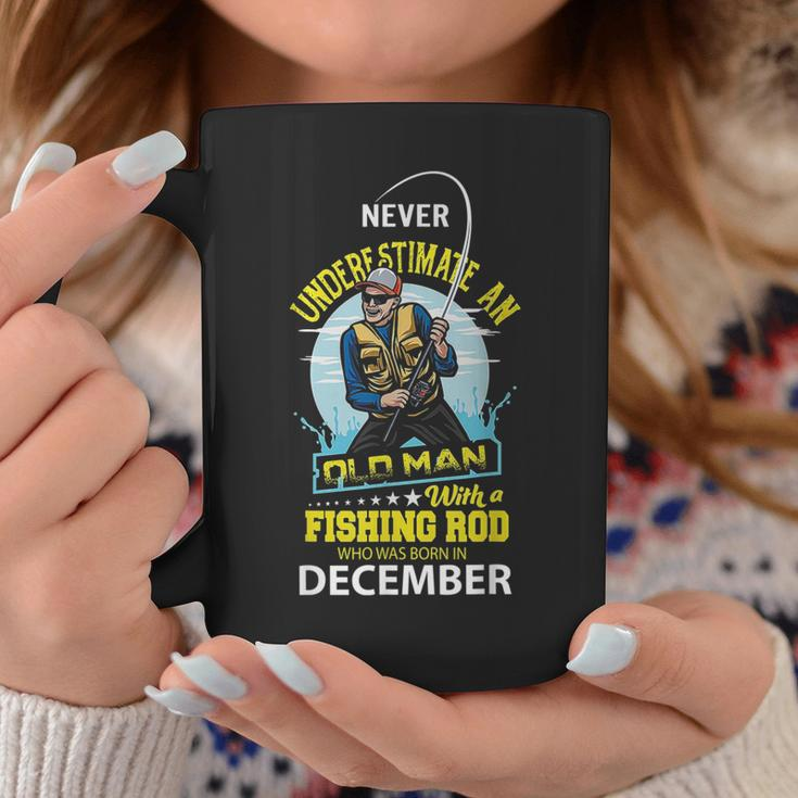 Never Underestimate Old Man With A Fishing Rod Born In Dec Coffee Mug Funny Gifts