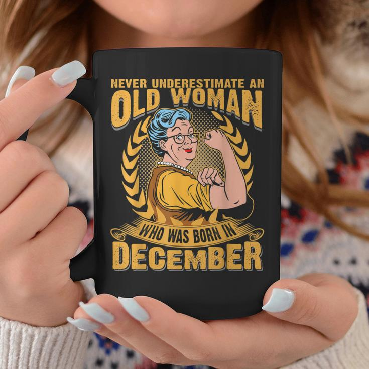 Never Underestimate An Old Woman Who Born In December Coffee Mug Funny Gifts