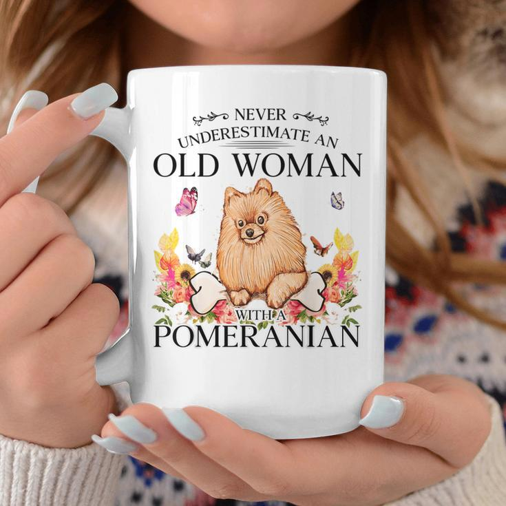 Never Underestimate An Old Woman With A Pomeranian Coffee Mug Unique Gifts