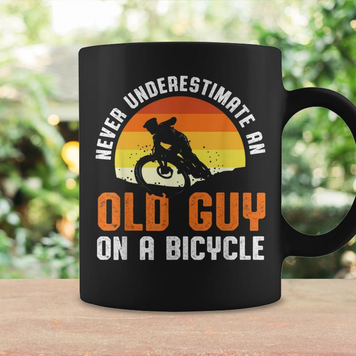 Never Underestimate An Old Guy On A Bicycle Funny Riders Dad Coffee Mug Gifts ideas