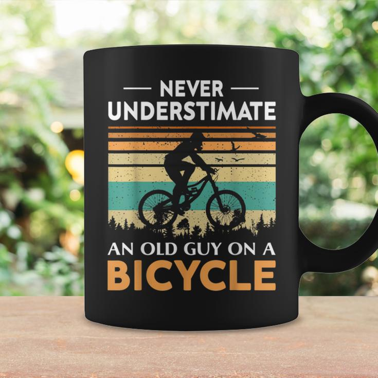 Never Underestimate An Old Guy On A Bicycle Cycling Vintage Coffee Mug Gifts ideas