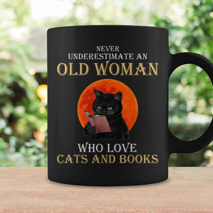 Never Underestimate An Old Woman Who Love Cats And Books Coffee Mug Gifts ideas