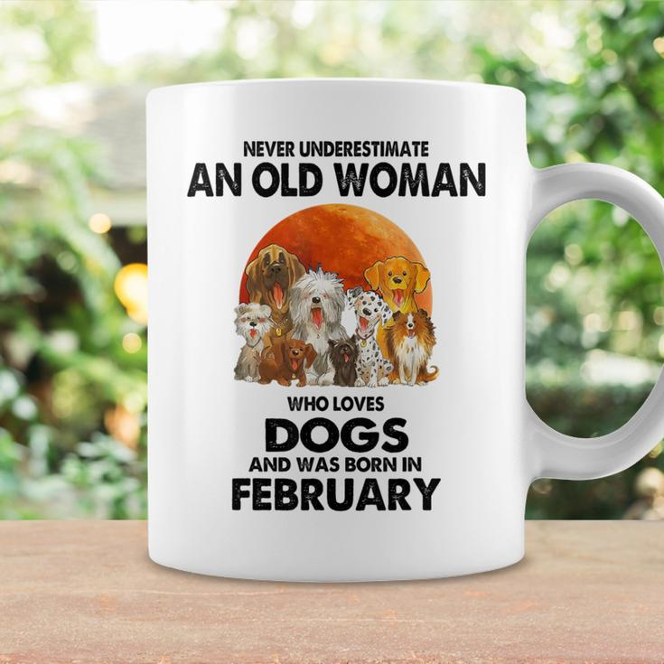 Never Underestimate An Old Woman Who Loves Dogs February Coffee Mug Gifts ideas