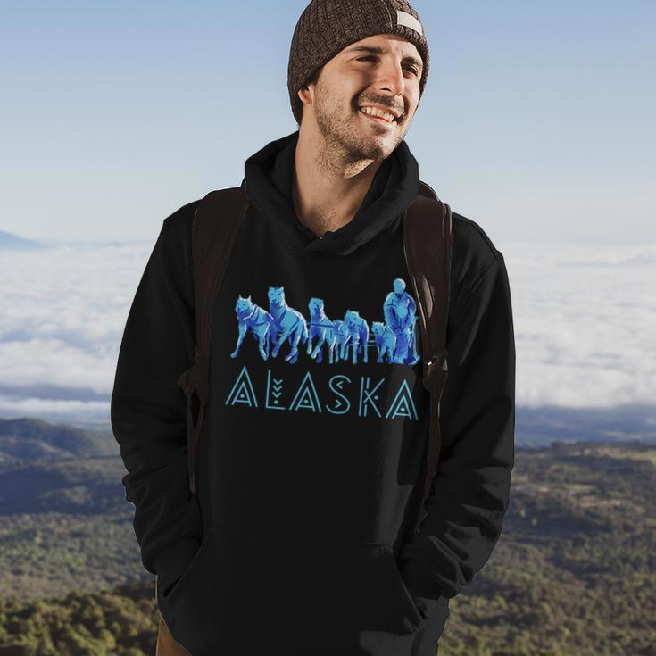 Alaska Sled Dogs Mushing Team Snow Sledding Mountain Scene Hoodie Lifestyle