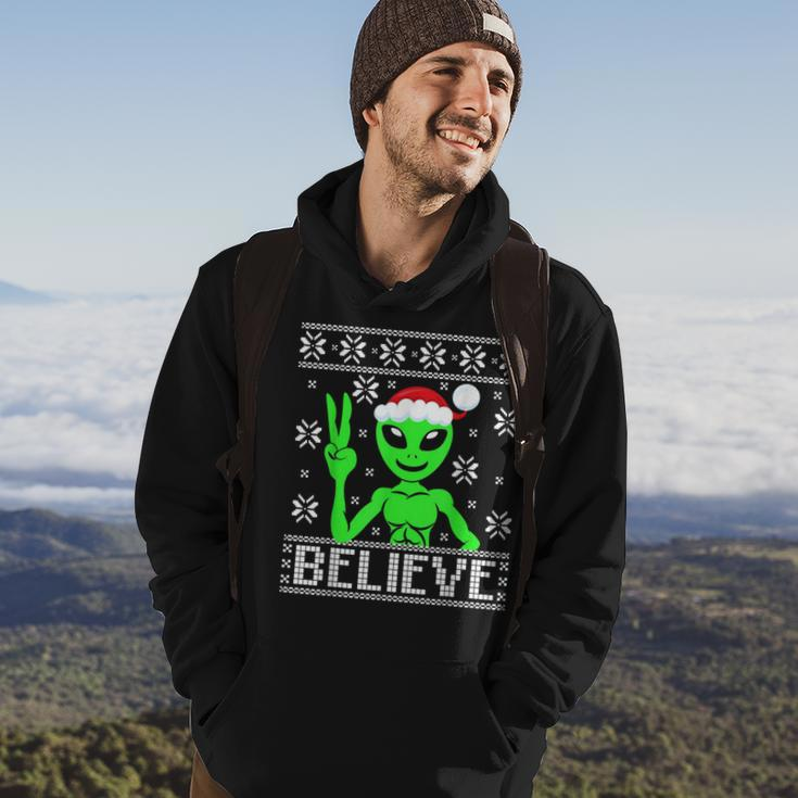 Alien Believe Ugly Christmas Sweater Hoodie Lifestyle