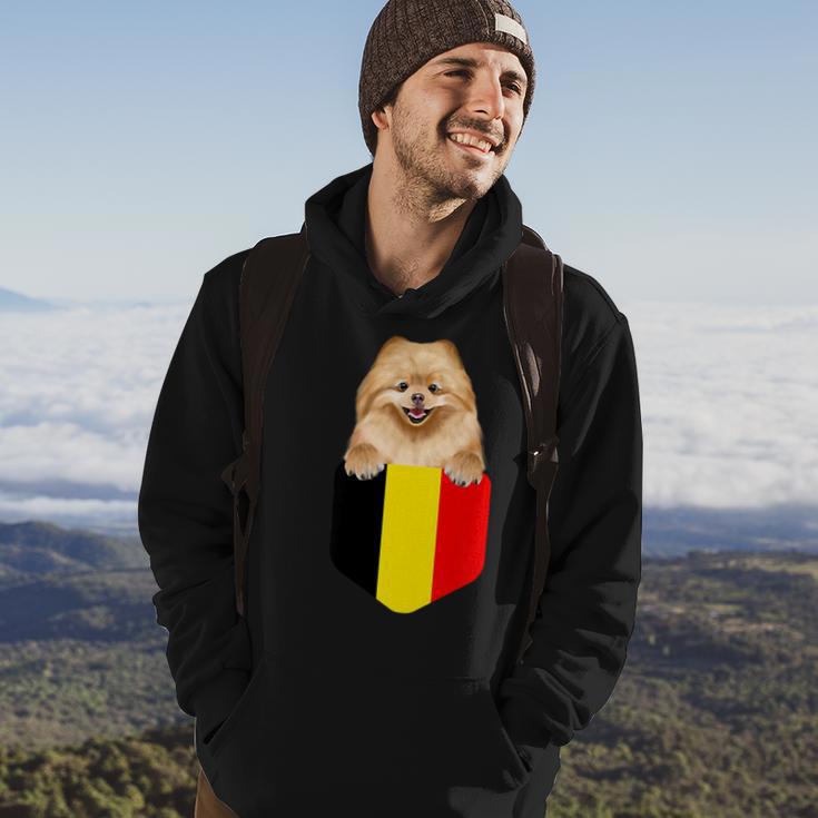 Belgium Flag Pomeranian Dog In Pocket Hoodie Lifestyle