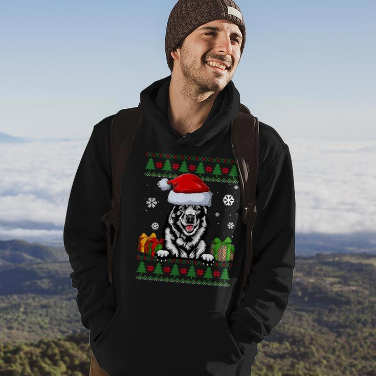 Norwegian Elkhound Santa Hat Ugly Christmas Sweater Hoodie Lifestyle