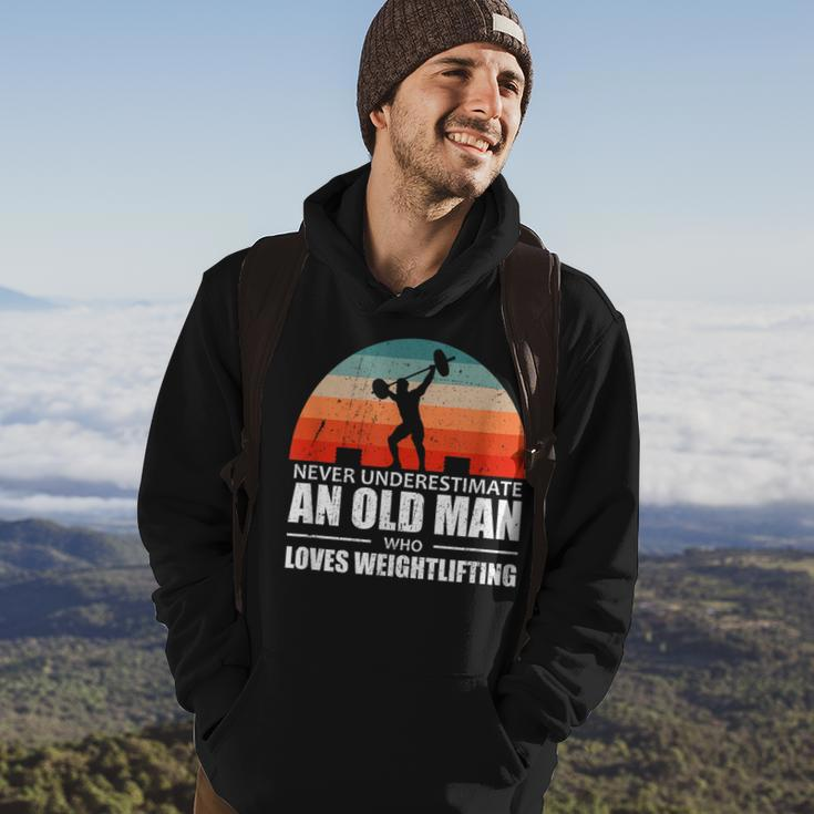 Gym Never Underestimate An Old Man Who Loves Weightlifting Gift For Mens Hoodie Lifestyle