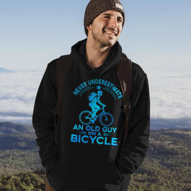 Never Underestimate An Old Guy On A Bicycle Nice Cycling Hoodie Lifestyle