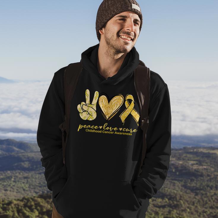 Peace Love Cure Yellow Ribbon Childhood Cancer Awareness Hoodie Lifestyle