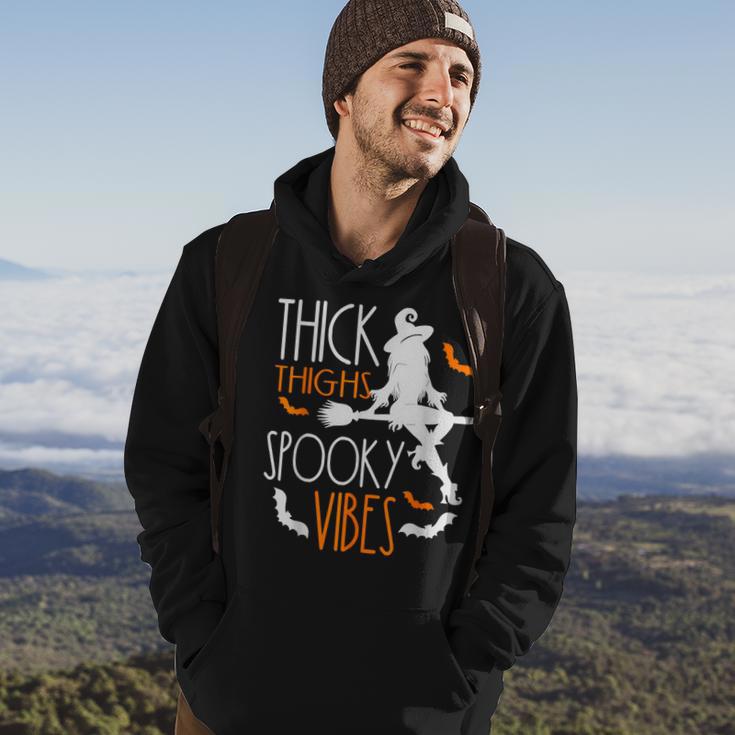 Thick Thighs Spooky Vibes Pretty Eyes Witch Halloween Party Hoodie Lifestyle