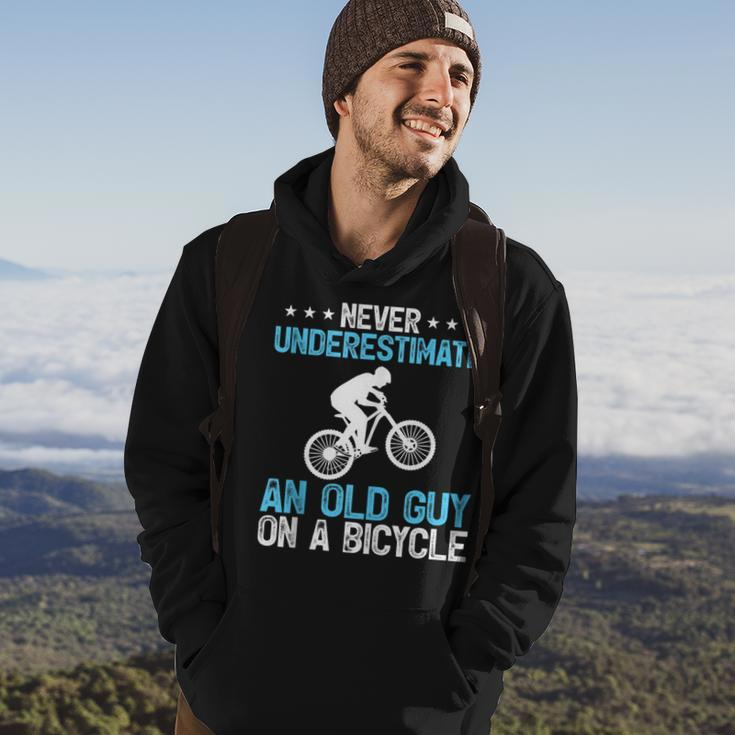 Never Underestimate An Old Guy On A Bicycle Cycling Biker Hoodie Lifestyle