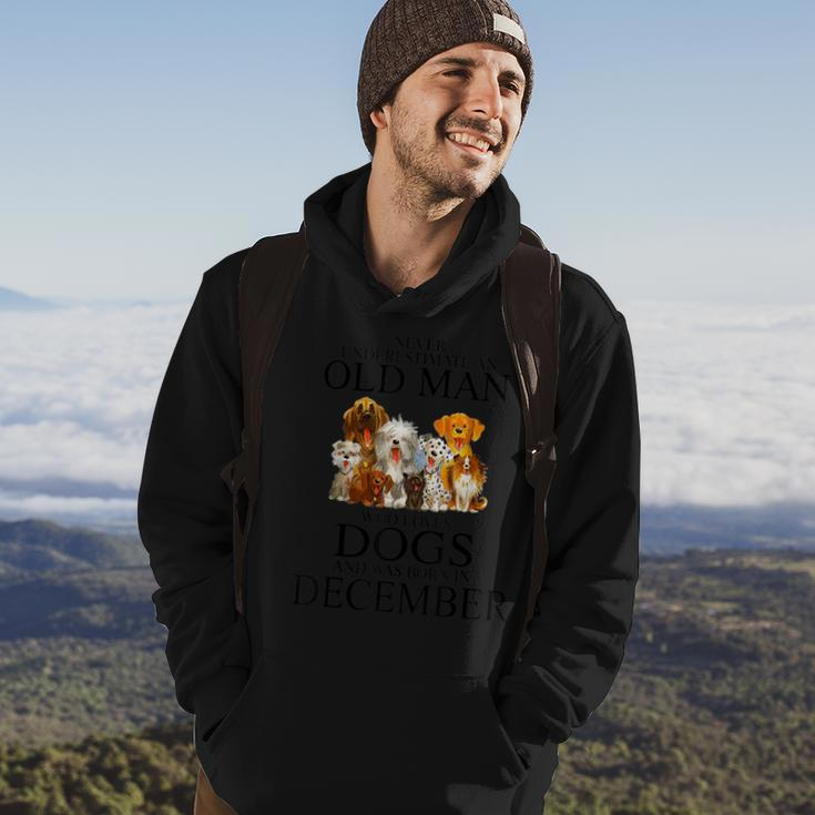 Never Underestimate An Old Man Who Loves Dogs In December Hoodie Lifestyle