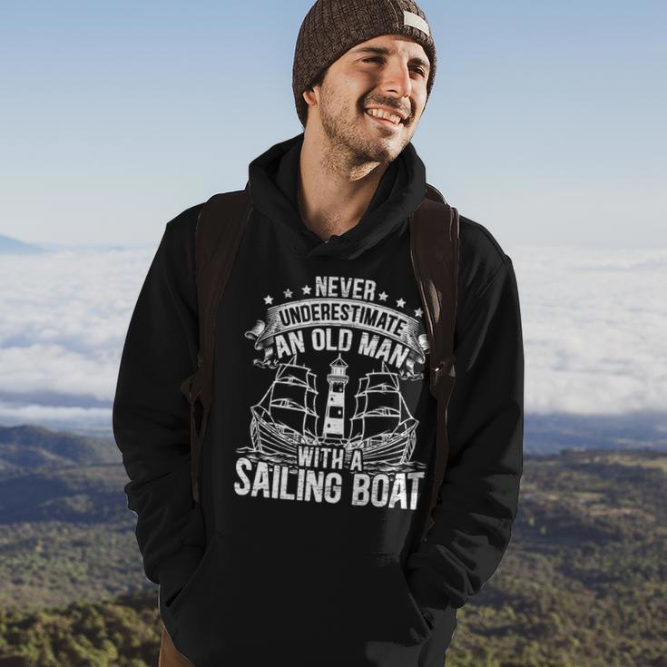 Never Underestimate An Old Man With A Sailing Boat Sailor Hoodie Lifestyle