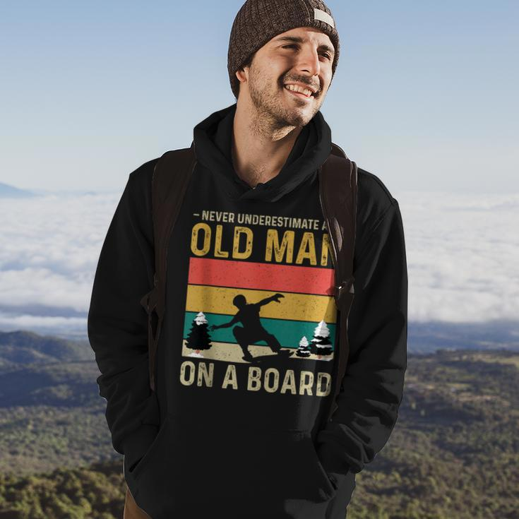 Never Underestimate An Old Man On A Snowboard Vintage Hoodie Lifestyle