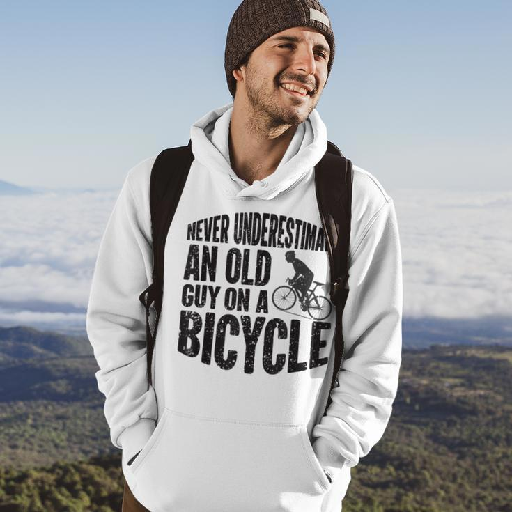 Funny Cycling Never Underestimate An Old Guy On A Bicycle Cycling Funny Gifts Hoodie Lifestyle