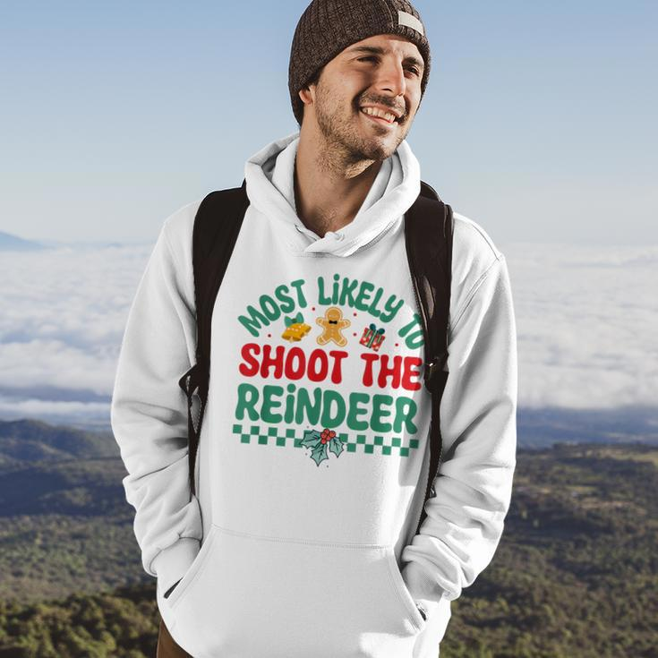 Most Likely To Shoot The Reindeer Christmas Pajamas Hoodie Lifestyle