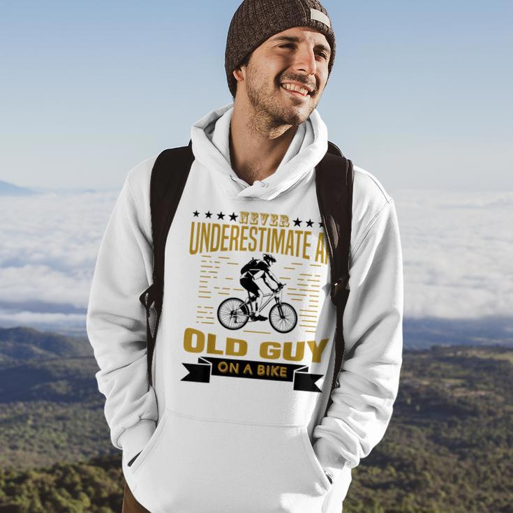 Never Underestimate An Old Guy On A Bicycle Cycling Lover Cycling Funny Gifts Hoodie Lifestyle