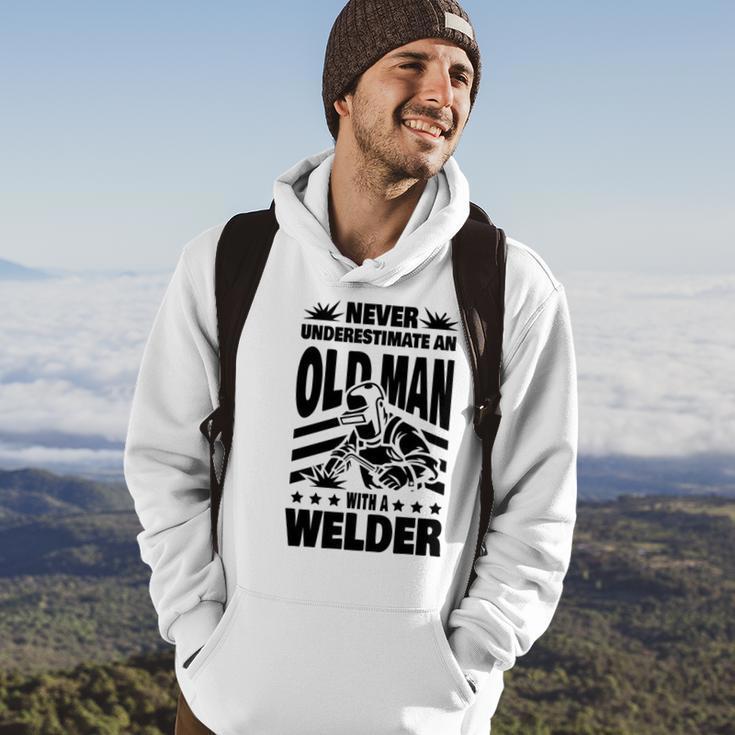 Never Underestimate An Old Man With A Welder Dad Hoodie Lifestyle