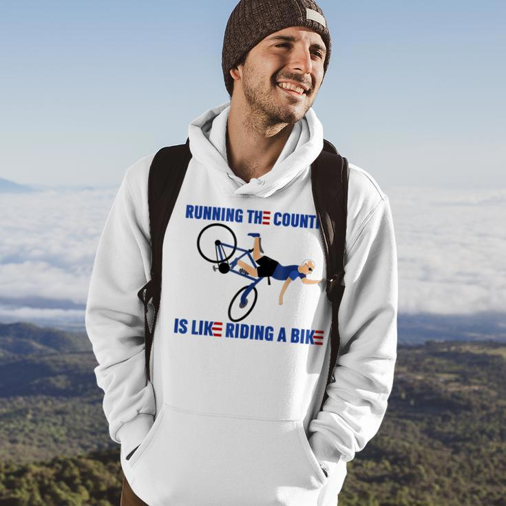 Running The Country Is Like Riding A Bike Joe Biden Funny Running Funny Gifts Hoodie Lifestyle