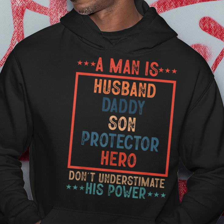 A Man Is Husband Daddy Son Protector Hero Fathers Day Hoodie Unique Gifts