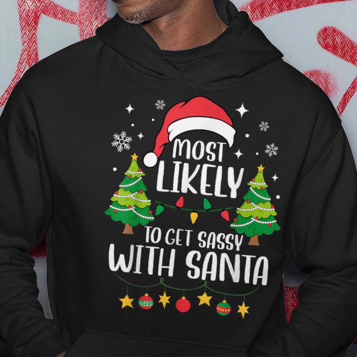 Most Likely To Get Sassy With Santa Matching Christmas Hoodie Funny Gifts