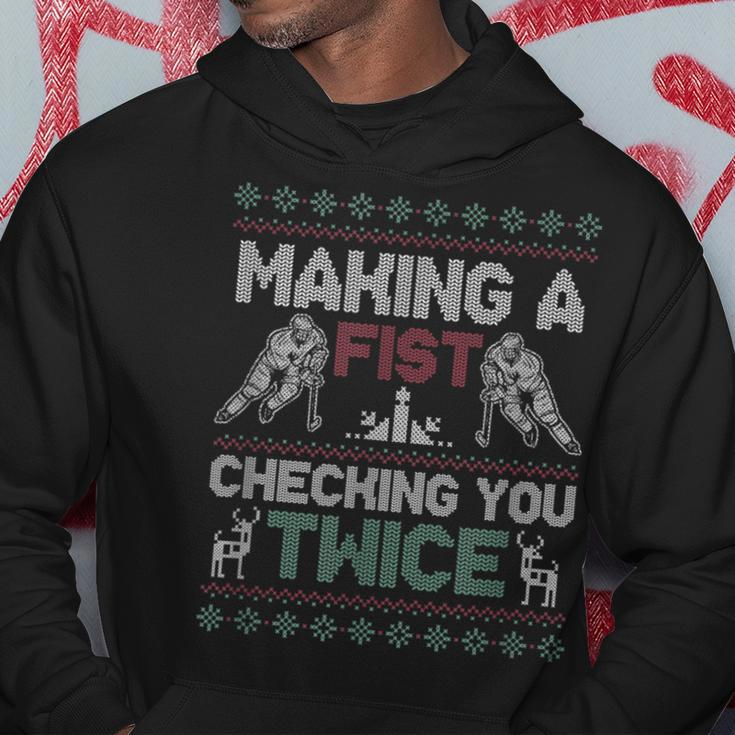 Making A Fist Checking You Twice Ugly Christmas Pajama Party Hoodie Unique Gifts