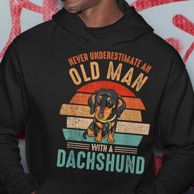 Mb Never Underestimate An Old Man With A Dachshund Hoodie Funny Gifts
