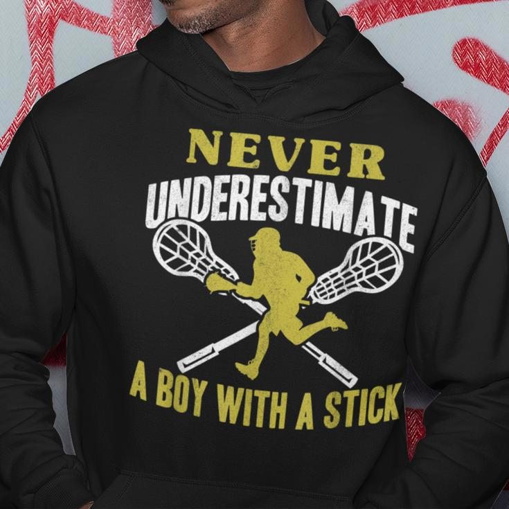 Never Underestimate A Boy With A Stick Lax Player Lacrosse Lacrosse Funny Gifts Hoodie Unique Gifts