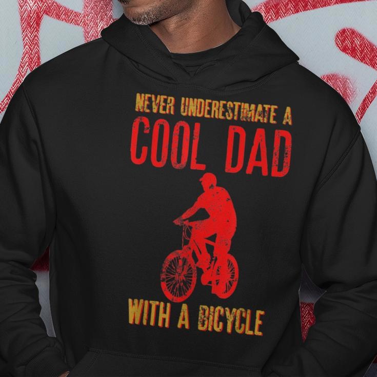 Never Underestimate A Cool Dad With A Bicycle Cool Gift Gift For Mens Hoodie Funny Gifts