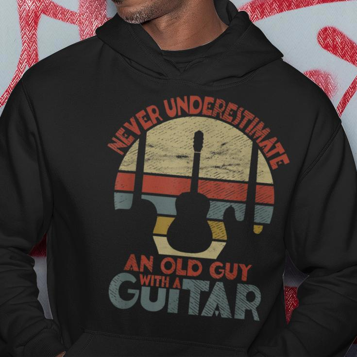 Never Underestimate An Old Guy With A Guitar Funny Guitar Gift For Mens Hoodie Unique Gifts