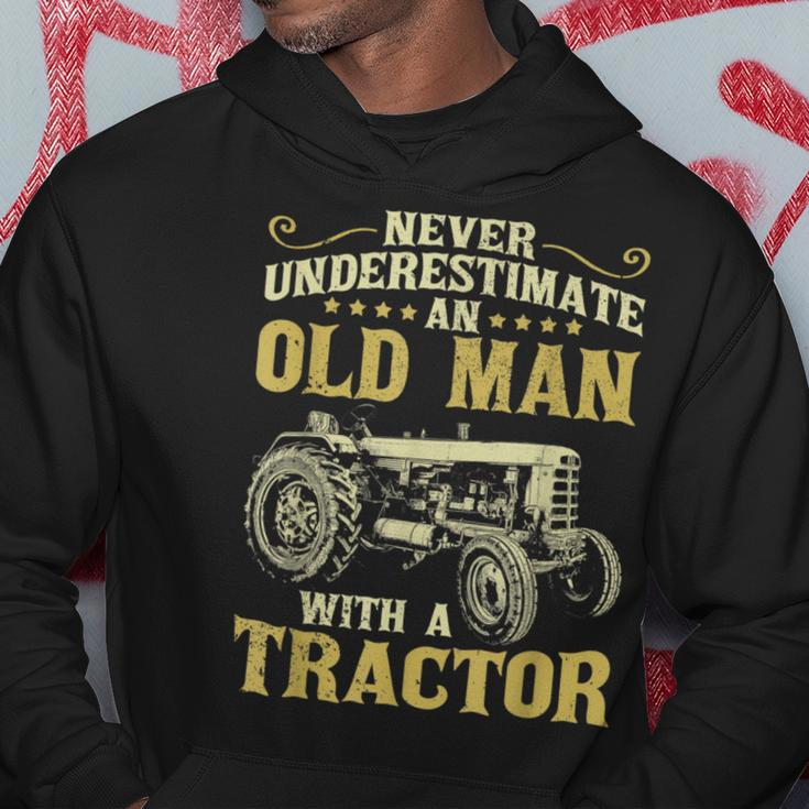 Never Underestimate An Old Man Funny Tractor Farmer Dad Gift For Mens Hoodie Funny Gifts