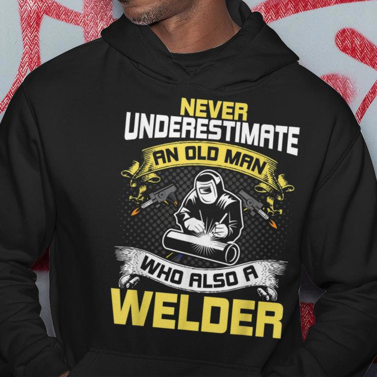 Never Underestimate An Old Man Who Also A Welder Hoodie Funny Gifts