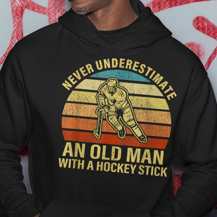 Never Underestimate An Old Man With A Hockey Stick Gift Old Man Funny Gifts Hoodie Unique Gifts