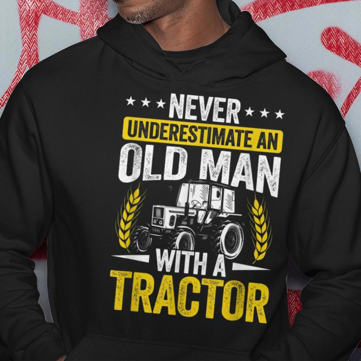 Never Underestimate An Old Man With A Tractor Farmer Field Gift For Mens Hoodie Funny Gifts