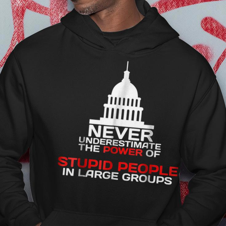 Never Underestimate Stupid People In Large Groups Political Political Funny Gifts Hoodie Unique Gifts
