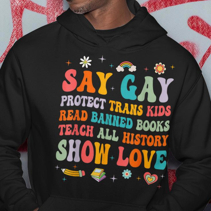 Say Gay Protect Trans Kids Read Banned Books Lgbt Groovy Hoodie Unique Gifts