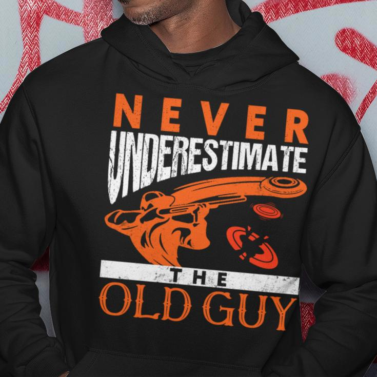 Skeet Shooting Never Underestimate The Old Guy Trap Shooters Skeet Shooting Funny Gifts Hoodie Unique Gifts