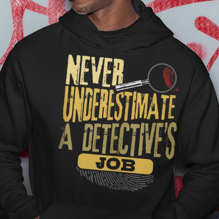 Never Underestimate A Detective's Job Hoodie Funny Gifts