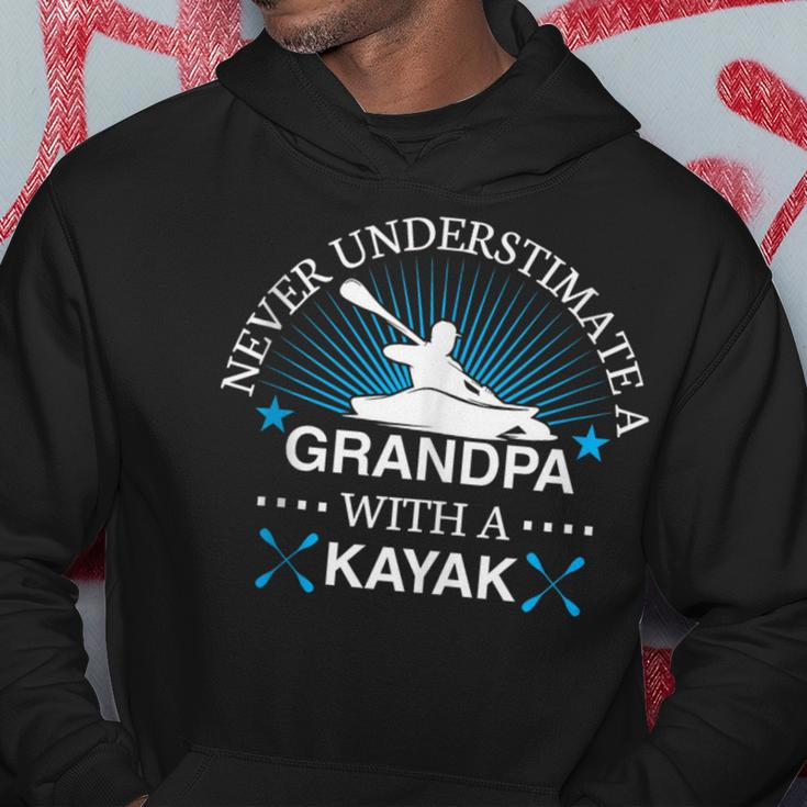Never Underestimate A Grandpa With A Kayak Kayaking Hoodie Unique Gifts