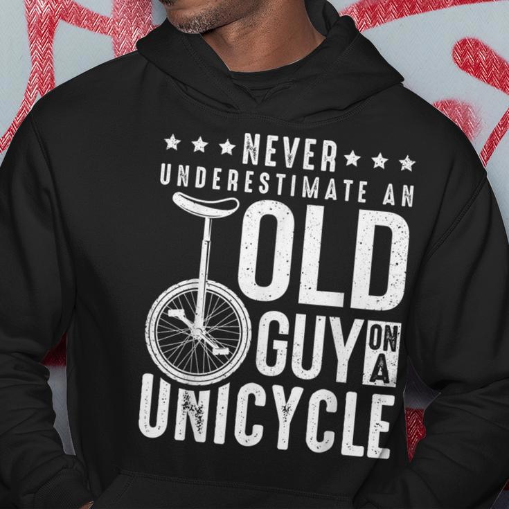 Never Underestimate An Old Guy On A Unicycle Hoodie Unique Gifts