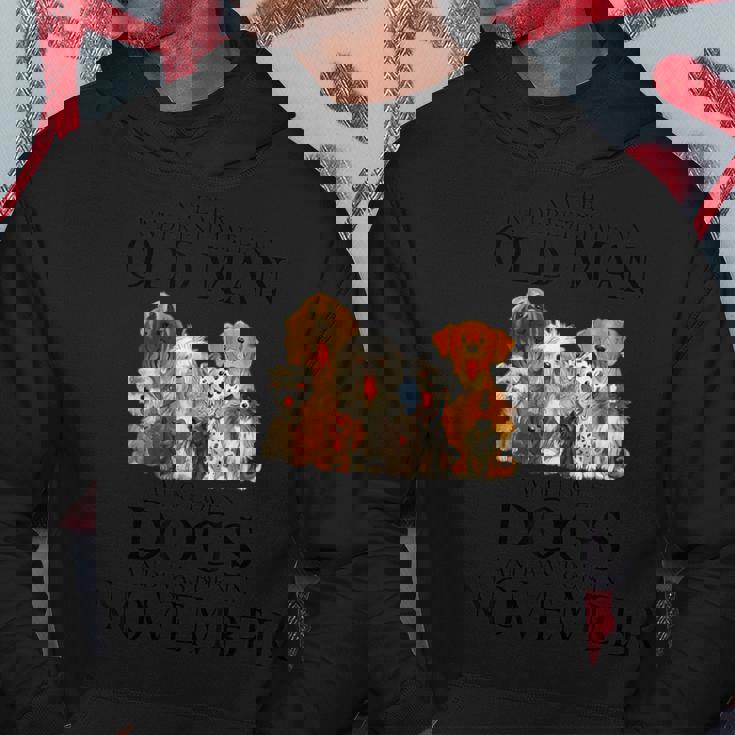 Never Underestimate An Old Man Who Loves Dogs In November Hoodie Funny Gifts