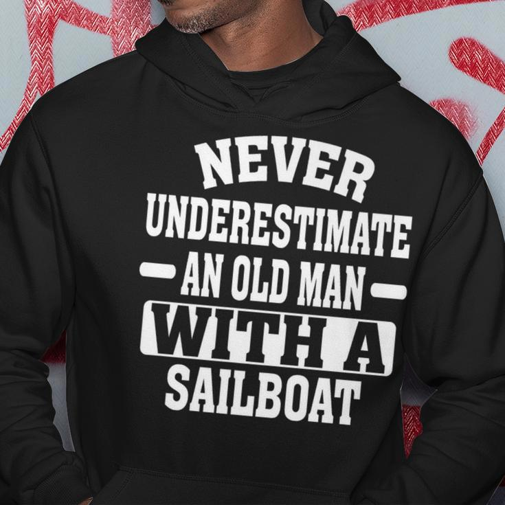 Never Underestimate An Old Man With A Sailboat Hoodie Funny Gifts