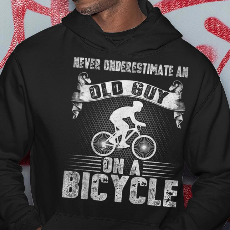 Vintage Never Underestimate An Old Guy On A Bicycle Cycling Cycling Funny Gifts Hoodie Unique Gifts