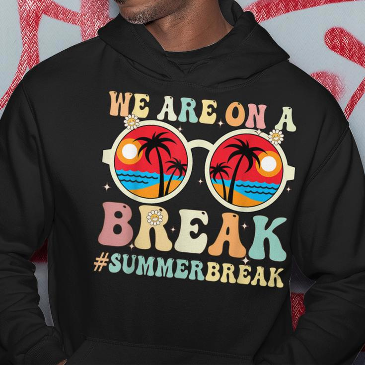 We Are On A Break Teacher Retro Groovy Summer Break Teachers Hoodie Funny Gifts