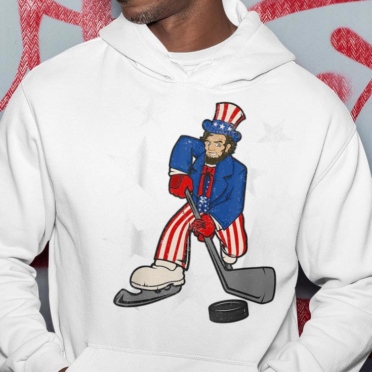 Abraham Lincoln Playing Hockey Funny 4Th Of July Hockey Hoodie Unique Gifts
