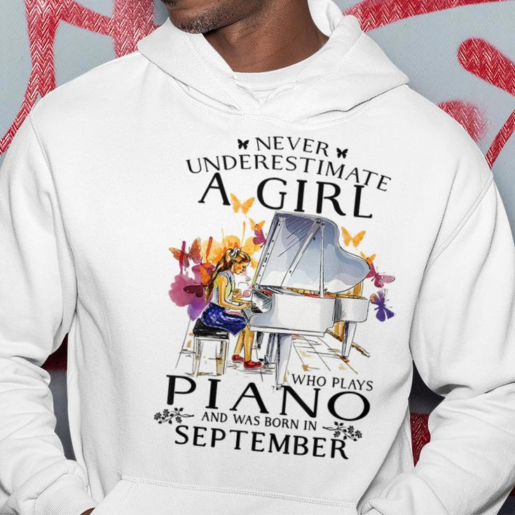 Never Underestimate A Girl Who Plays Piano Born In September Piano Funny Gifts Hoodie Unique Gifts