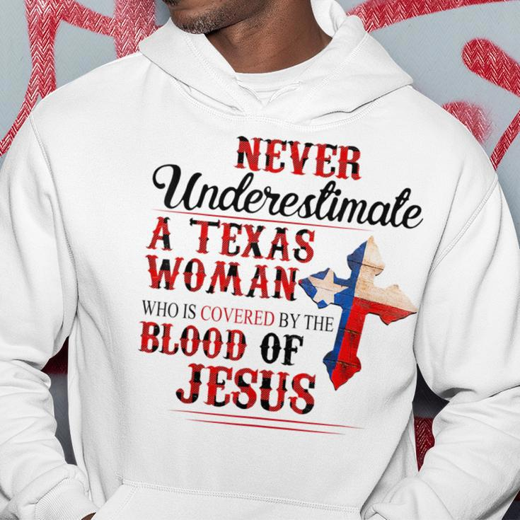 Never Underestimate A Texas Woman Who Is Covered By Blood Texas Funny Designs Gifts And Merchandise Funny Gifts Hoodie Unique Gifts