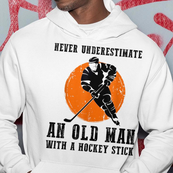 Never Underestimate An Old Man With A Hockey Stick Funny Gift For Mens Hoodie Unique Gifts